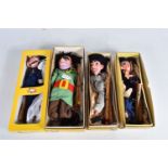 FOUR BOXED PELHAM PUPPETS, SL Giant, SL Guitar Player and two SM6 Policeman, all appear complete and