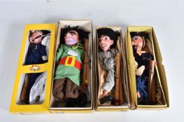 FOUR BOXED PELHAM PUPPETS, SL Giant, SL Guitar Player and two SM6 Policeman, all appear complete and