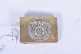 A GERMAN S.A BELT BUCKLE, this features a brass buckle with a white metal centre, an eagle and