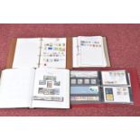 COLLECTION OF STAMPS IN FOUR ALBUMS, we note GB presentation packs and a GB QE2 mint and used