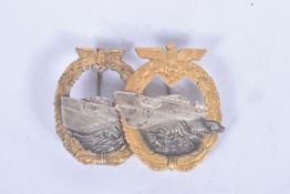 TWO GERMAN KRIEGSMARINE BADGES, the first is a fast attack craft war badge with rounded pin and no