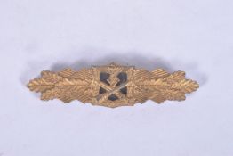 A WW2 ERA GERMAN CLOSE COMBAT CLASP, THIS IS A BRONZE VERSION AND BEARS the maker F.E.C. W.F