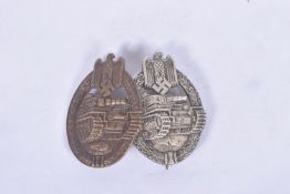 TWO GERMAN THIRD REICH PANZER ASSAULT BADGES, one is bronze in colour with a rounded pin and has