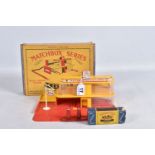 A BOXED LESNEY MATCHBOX SERIES SALES AND SERVICE STATION, yellow and red in construction with a