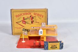 A BOXED LESNEY MATCHBOX SERIES SALES AND SERVICE STATION, yellow and red in construction with a