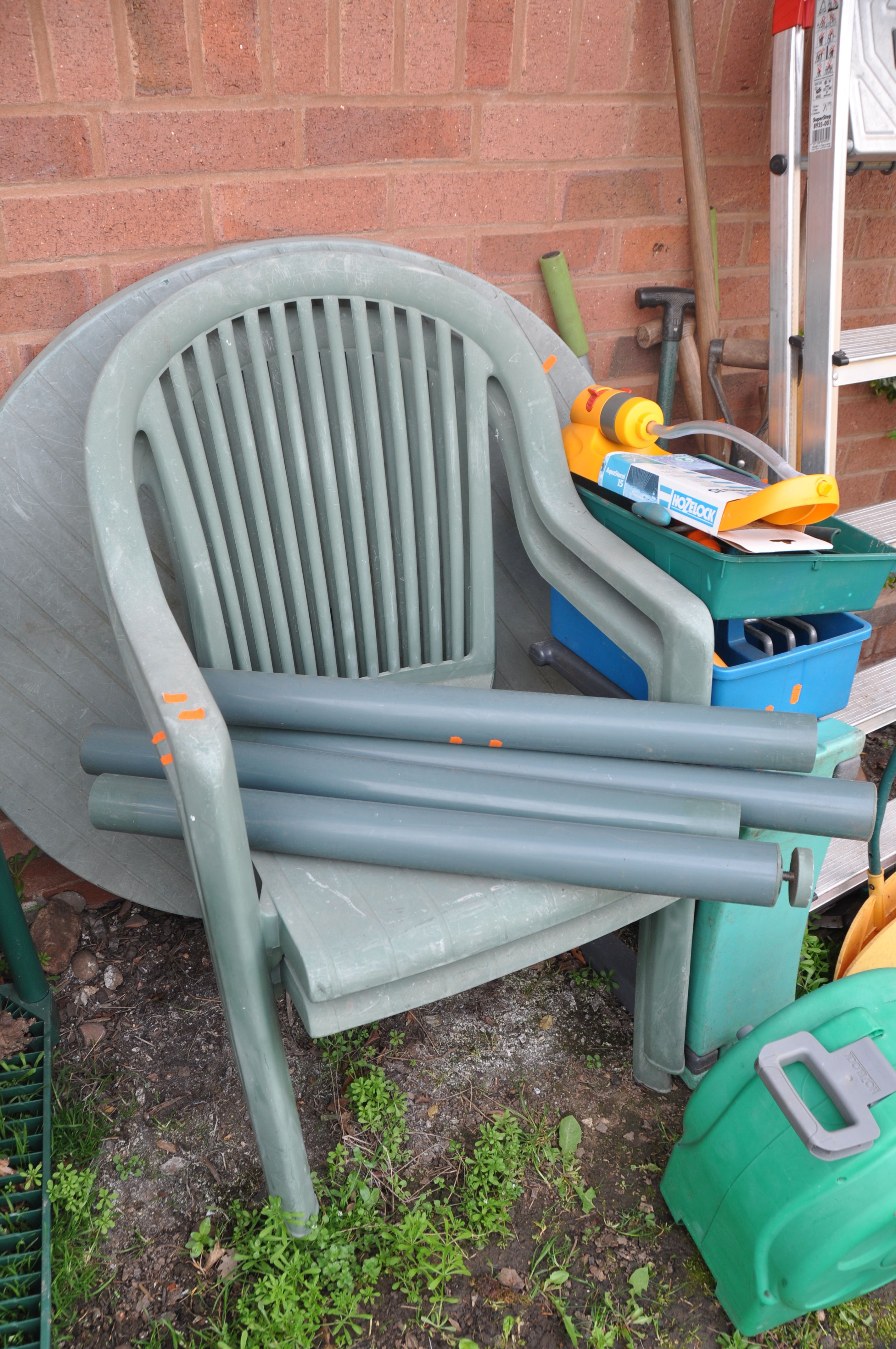 A SELECTION OF GARDEN ITEMS to include a plastic circular garden table with two chairs, a metal four - Image 2 of 3