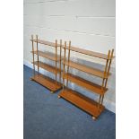 A PAIR OF MID CENTURY TEAK AND BEECH OPEN ROOM DIVIDING BOOKCASES, made up of four shelves joined by