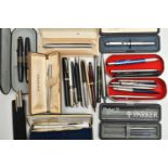 A TIN OF ASSORTED PENS, to include two brushed steel 'Sheaffer' ball point pens with boxes, a