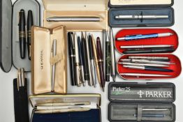 A TIN OF ASSORTED PENS, to include two brushed steel 'Sheaffer' ball point pens with boxes, a