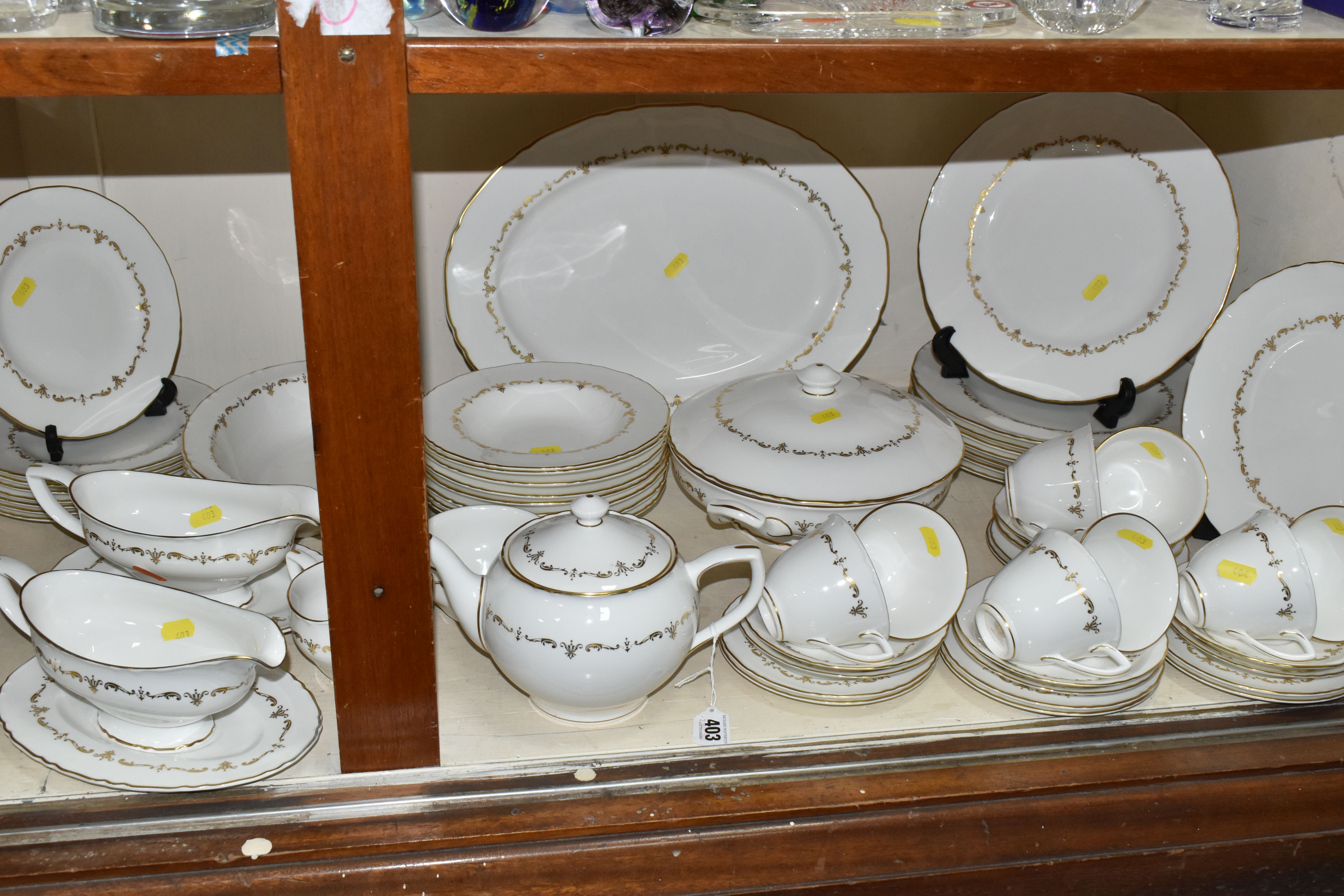 A ROYAL WORCESTER 'GOLD CHANTILLY' PATTERN DINNER SET, comprising eight dinner plates, one meat