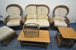 A SEVEN PIECE WICKER CONSERVATORY SUITE, comprising a two seater sofa, length 136cm, a pair of