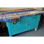 A WOODEN WORKBENCH with two Record 52E vices attached (paint spills to surface)