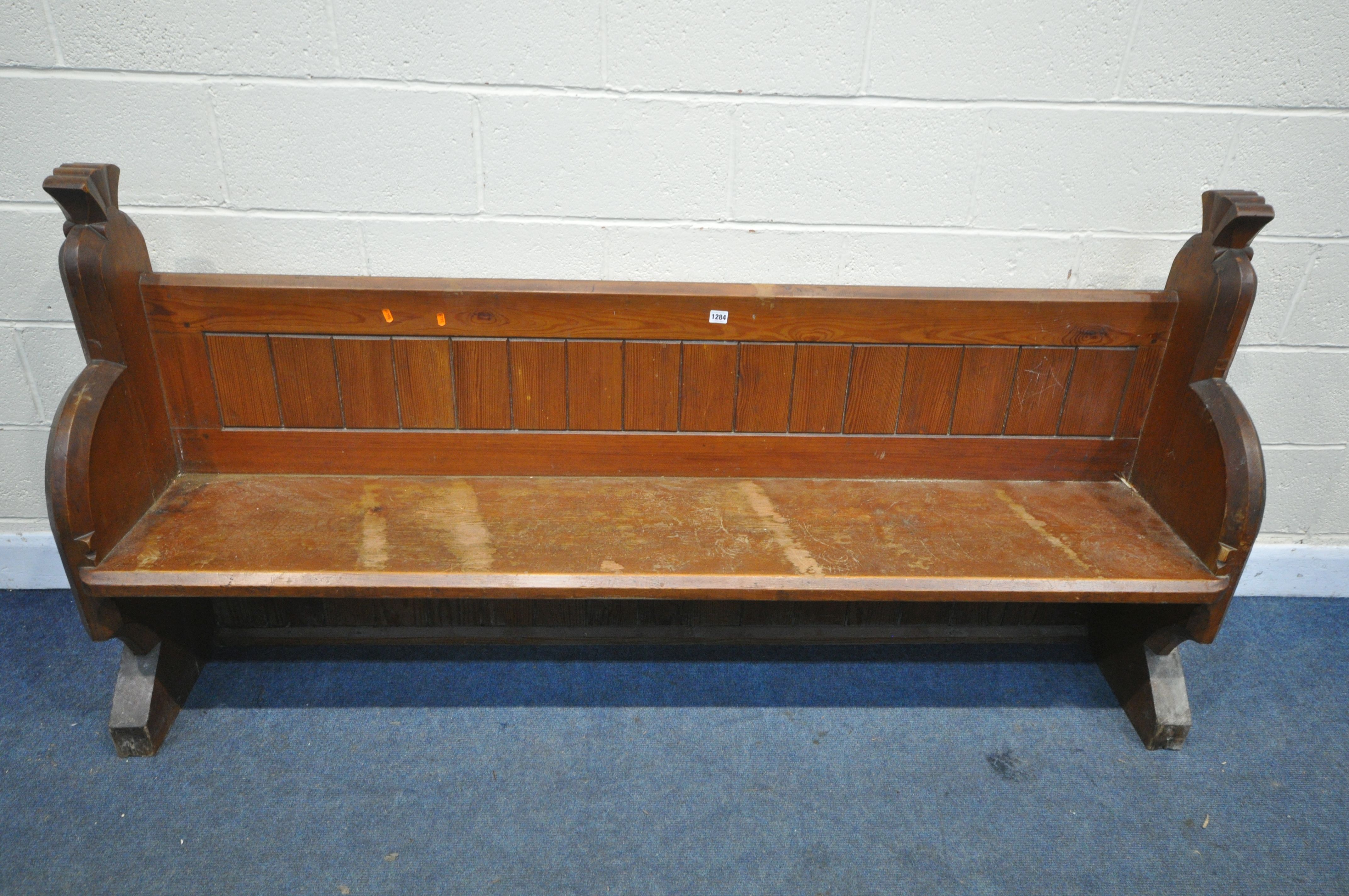 A PITCH PINE CHURCH PEW, length 197cm x depth 50cm x height 97cm (condition:-worn and water - Image 3 of 4