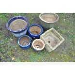 A SELECTION OF PLANT POTS to include five circular glazed pots all diferent sizes along with a