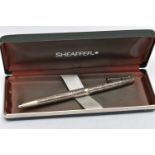A SILVER SHEAFFER PEN, ball point pen with foliage etched detail, hallmarked London import 1975,