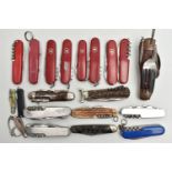 AN ASSORTMENT OF SWISS ARMY KNIVES, twenty knives, predominantly 'Victorinox', (condition report:
