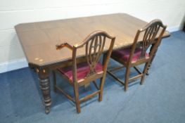 AN EDWARDIAN MAHOGANY WIND OUT DINING TABLE, with two additional leaves, extended length width, open