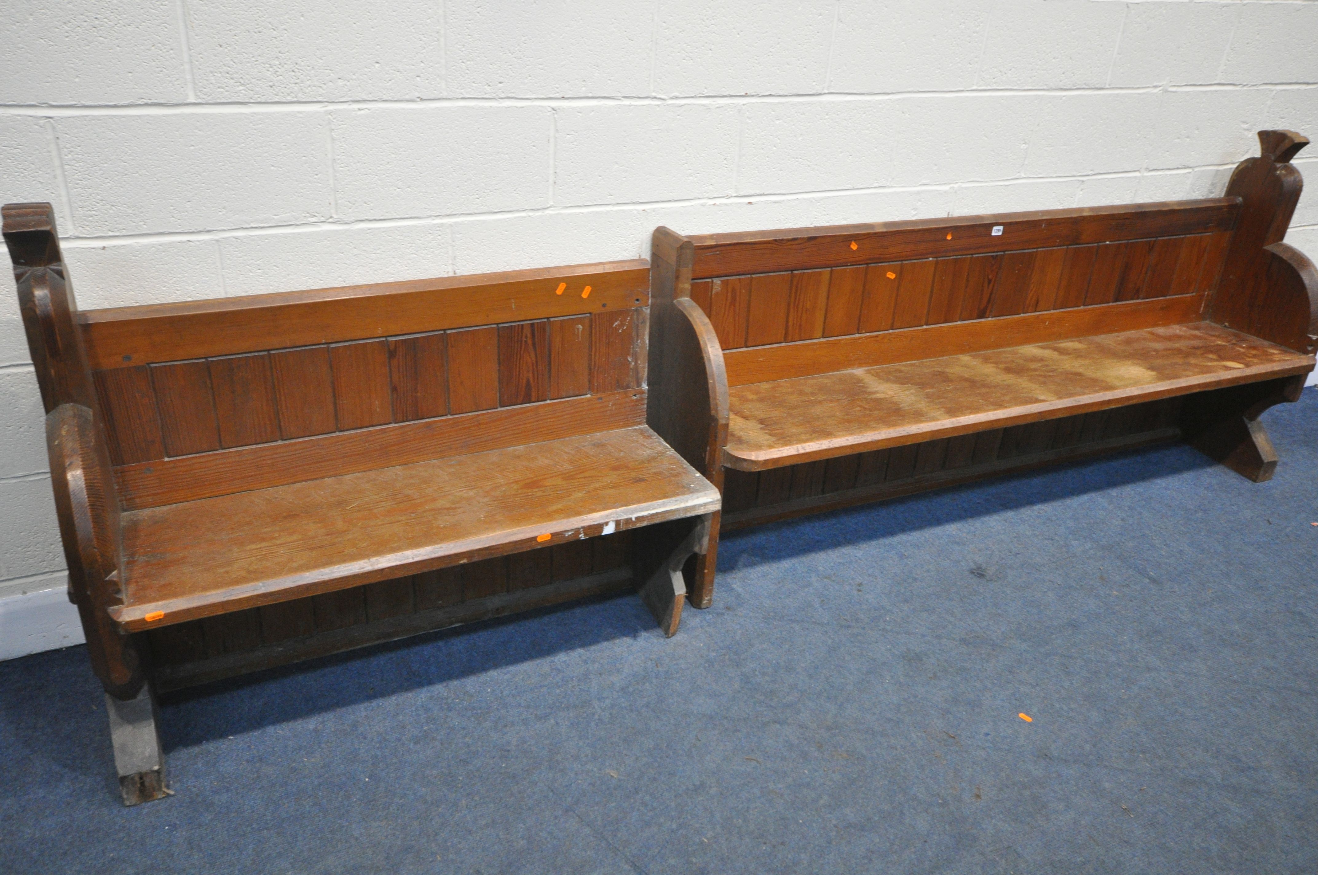 A PITCH PINE CHURCH PEW, length 197cm x depth 47cm x height 97cm, along with a matching church pew