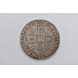 A CHARLES II 1663 CROWN COIN, ANNO REGINI XV Fine or better