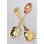 TWO 1970'S DANISH SILVER GILT AND ENAMEL YEAR SPOONS BY GEORG JENSEN AND ANTON MICHELSEN, the
