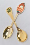 TWO 1970'S DANISH SILVER GILT AND ENAMEL YEAR SPOONS BY GEORG JENSEN AND ANTON MICHELSEN, the