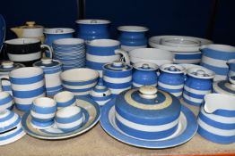 A COLLECTION OF T G GREEN CORNISH WARE, over thirty mostly blue banded pieces, to include a yellow