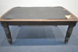 A LARGE 19TH CENTURY OAK LIBRARY TABLE, with a leatherette writing surface, with a frieze drawer