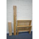 A MODERN LIGHT OAK SINGLE BED, with side rails and bolts (condition:- good condition)