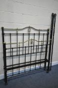 A 19TH CENTURY BRASS AND IRON 4FT 6 BEDSTEAD, with brass finials with a centred motif (condition:-