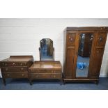 AN EARLY 20TH CENTURY OAK BEDROOM SUITE, comprising a single mirror door wardrobe width 118cm x