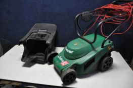 A QUALCAST COBRA QUIET32 LAWNMOWER with grass box (PAT pass and working)