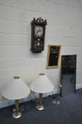 A PAIR OF STAINLESS STEEL AND BEECH TABLE LAMPS, with a shade, along with a modern wall clock,