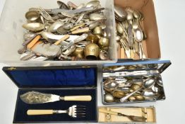 A PLASTIC BOX OF ASSORTED CUTLERY PIECES, to include a cased two piece fish server set, knives,