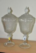 A PAIR OF LATE 20TH CENTURY AMERICAN 'INDIANA GLASS' CLEAR PRESSED GLASS JARS AND COVERS OF