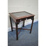 A VICTORIAN STYLE MAHOGANY BIJOUTERIE TABLE, on shaped legs, united by a cross stretcher, width 57cm