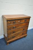 A VICTORIAN FLAME MAHOGANY CHEST OF TWO OVER THREE DRAWERS, with a shaped top and turned handles,