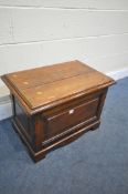 A 19TH CENTURY OAK LOG BIN, the lid is enclosing a removable galvanised lining, width x 68cm x depth