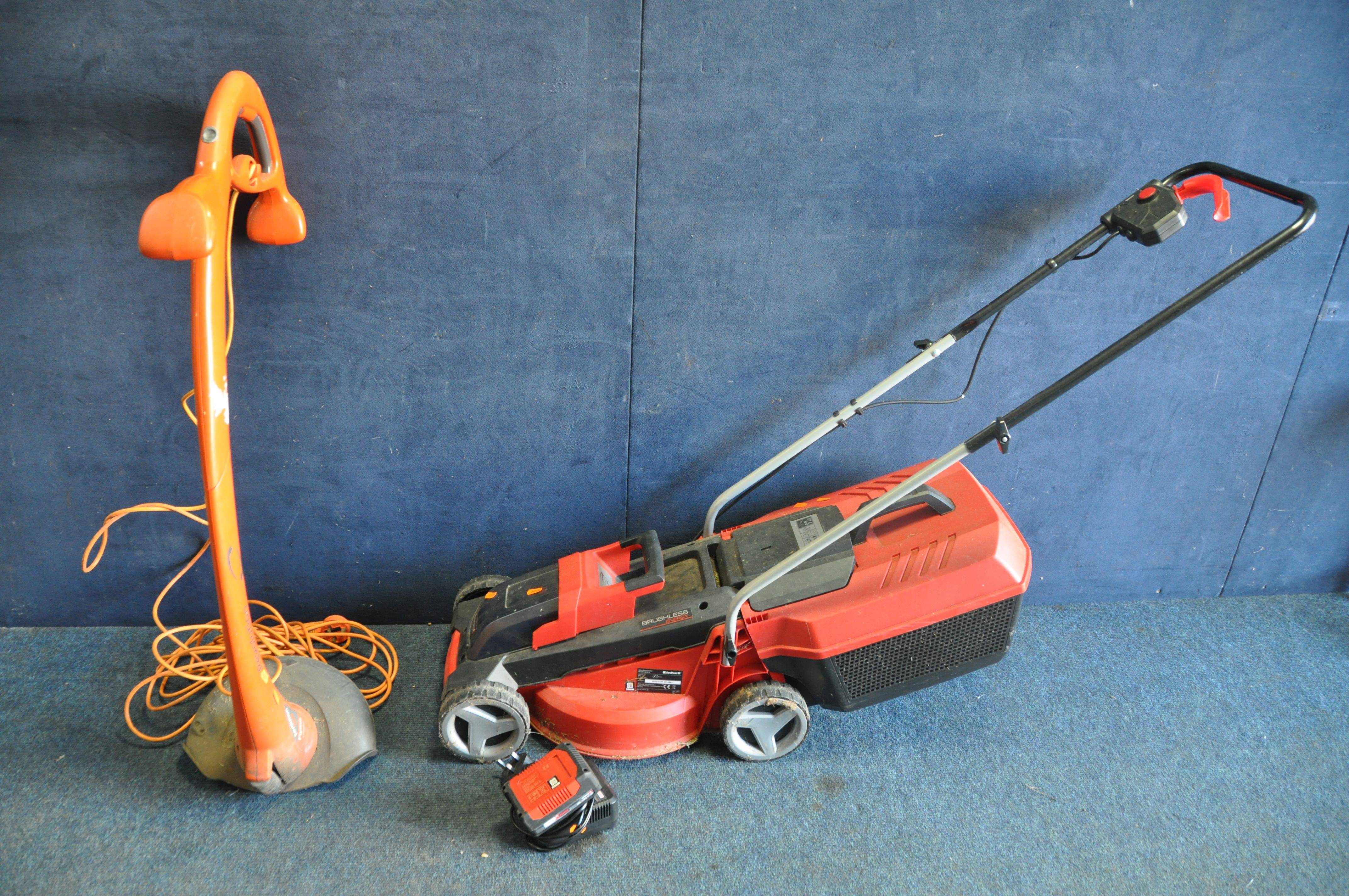 A EINHALL GE-CM18/30 CORDLESS LAWN MOWER with charger and battery (charger PAT pass and working)