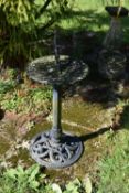 A MODERN CAST ALUMINIUM SUNDIAL ON STAND over painted in black 82cm high( this lot is not sold on