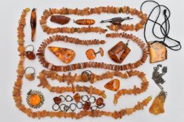 ASSORTED AMBER JEWELLERY, to include a natural butterscotch amber pendant, suspended from a white