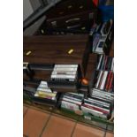 TWO BOXES AND FOUR CASES CONTAINING OVER ONE HUNDRED AND NINETY CDs, CASSETTE AND VIDEO TAPES