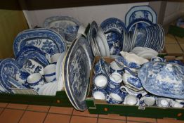 FOUR BOXES OF EARLY 20TH CENTURY BLUE AND WHITE CERAMICS, comprising a large quantity of plates,