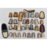 EIGHT SILVER THIMBLES AND A QUANTITY OF ASSORTED METAL THIMBLES, ETC, the silver thimbles include