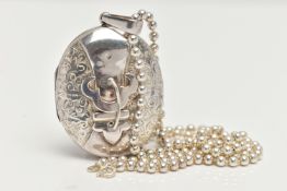 A WHITE METAL OVAL LOCKET WITH CHAIN, oval belt buckle detailed locket with a scrolling pattern,