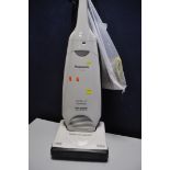 A PANASONIC MC-UG302 UPRIGHT VACUUM with spare bags (PAT pass and working)