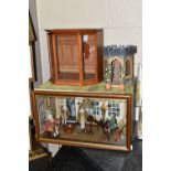 A TABLETOP DIORAMA MODELLED AS A MUSIC ROOM, glass front opens to reveal a furnished room with a