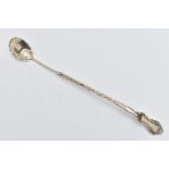 AN AMERICAN STERLING SILVER LADLE, the handle cast with scroll and shell decoration and engraved