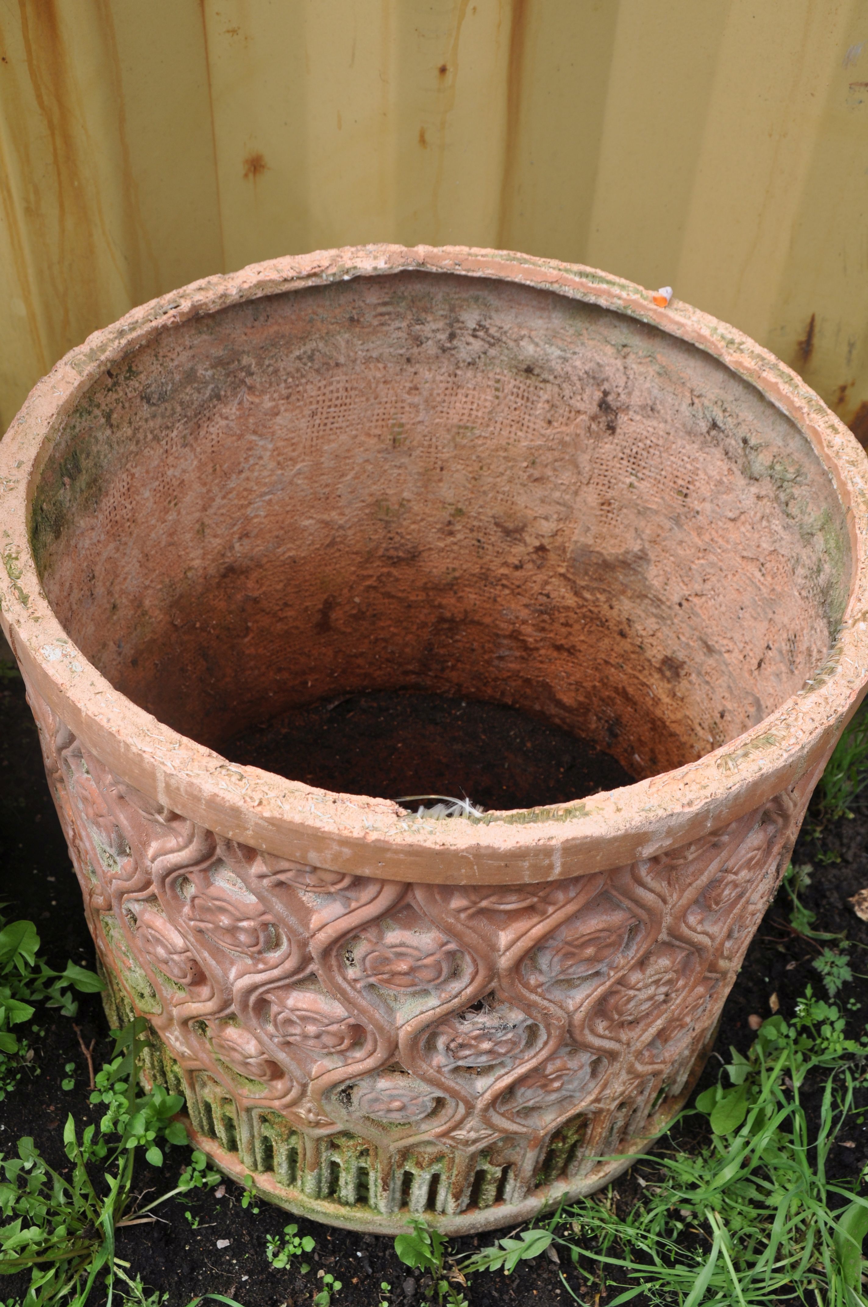 A SELECTION OF WEATHERED TERRACOTTA POTS comprising three circular terracotta pots and a smaller - Image 4 of 4