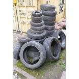 A SELECTION OF PART WORN TYRES of different sizes some still on steel rims (approx. 27 tires)