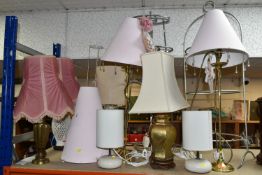 A GROUP OF EIGHT TABLE LAMPS, comprising two pairs of bedside lamps, two kitchen pots stands, two